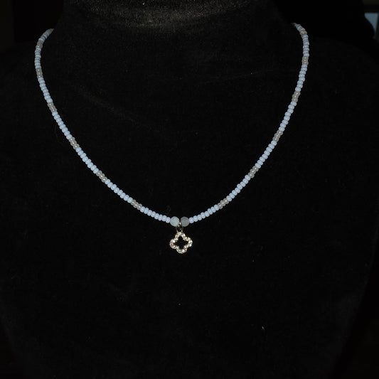 Beaded necklace with charm